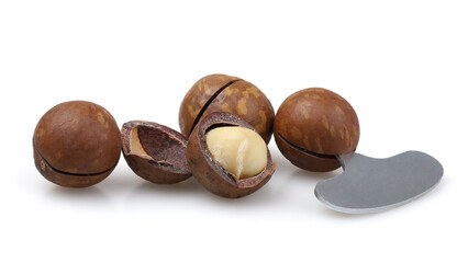 Macadamia nuts. Often sold with a tool for shelling them.