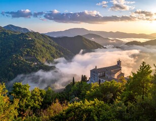 Stunning mountain vista with church in clouds