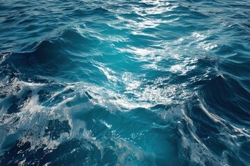 Realistic ocean water waves capturing sunlight in a tranquil marine environment at midday showcasing the deep blue hues and gentle ripples constantly moving