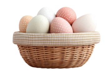 Wicker basket with pastel polka dot eggs on black background, cut out