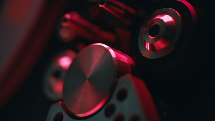 Macro view knobs reel-to-reel recorder in dark room. Closeup classic tape machine