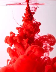 Red ink dissolving in water