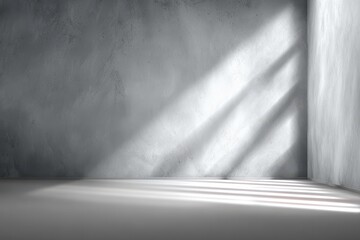 Gray background space with sunlight casting shadows, perfect for product showcasing and minimalist presentations in a clean environment