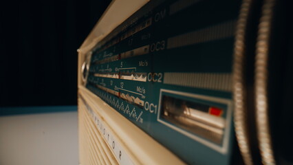 Closeup panel radio channels with adjustment knob. Macro analog signal receiver