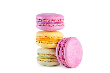 Stack of colorful French macarons isolated on white background.