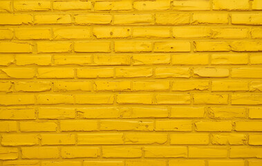 Obraz premium yellow brick wall background