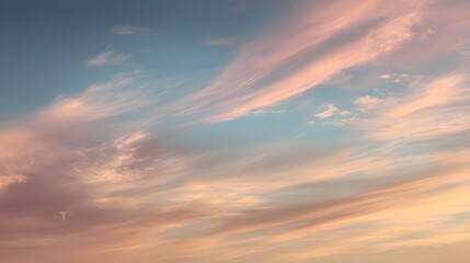Obraz premium Dramatic sunset sky with vibrant pink orange and blue hues streaking across the horizon illuminating scattered clouds creating a breathtaking atmospheric landscape scene