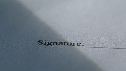 Macro shot signature place. Detailed contract document lying on desk surface