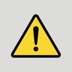A yellow warning sign with a black exclamation point is displayed
