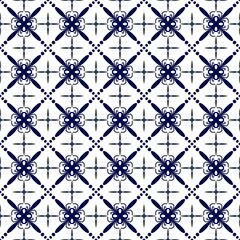 Fototapeta premium Monochrome Seamless Pattern with Geometric and Floral Motifs in Blue and White.