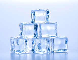 Clear Ice Cubes Stacked Beautifully Against a Soft Blue Background