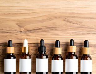Glass Bottles With Droppers on Wooden Surface Display for Products