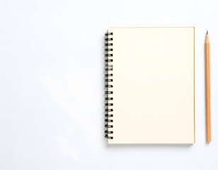 Blank Spiral Notebook with Pencil on Clean White Surface
