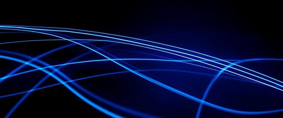 Abstract glowing blue streaks on dark background, representing high-speed data transfer, innovation, web