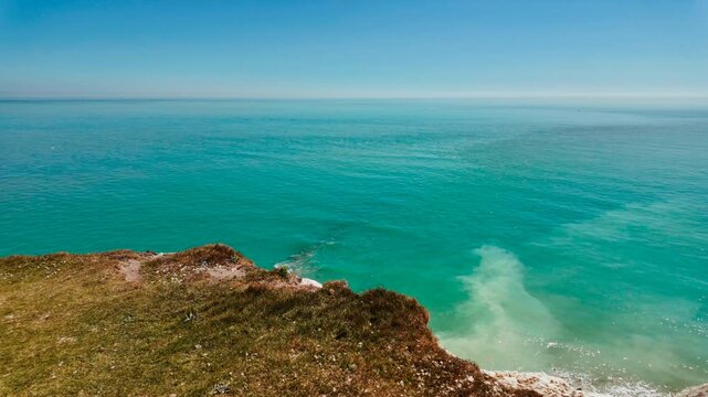 Rugged coast and railway line, Folkestone, Kent, England, UK, with chalk cliffs, sea views and tracks curving along the shoreline