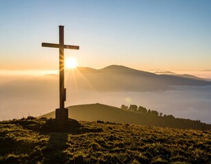 Sunrise over mountaintop cross