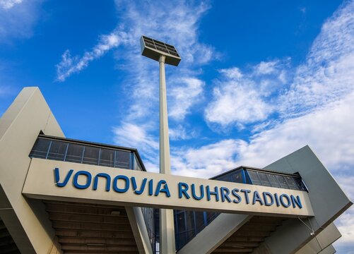Bochum, Germany - 25. September 2025: Vonovia Ruhrstadion entrance and spotlight against blue sky