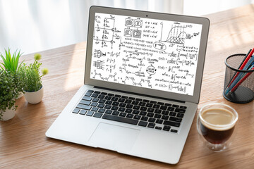 Mathematic equations and modish formula on computer screen showing concept of science and education