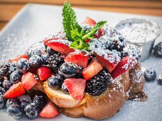 Challah French toast with berries at Sun in My Belly Cafe in Atlanta Georgia