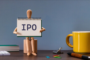 There is sticky note with the word IPO. It is an abbreviation for Initial Public Offering as eye-catching image.