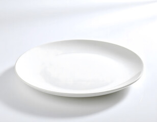 Empty White Plate on a Light Background with Soft Shadow Effect