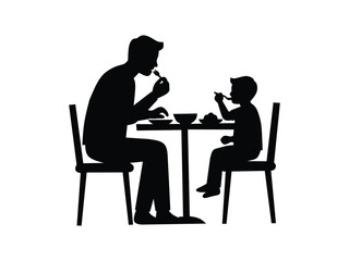 silhouette of father and son eating together