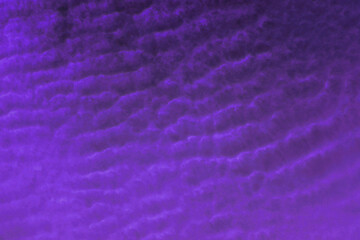Violet and black background and cloudy sky. Textured background. Dark and danger. Purple sky and smoke. Textured design for paper or fabric.