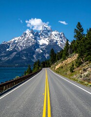 Fototapeta premium Scenic mountain road by lake