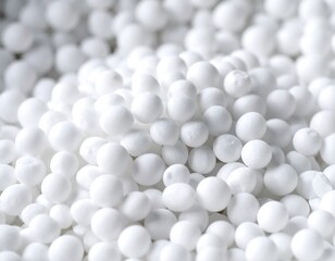 Close-up view of many white, round pellets
