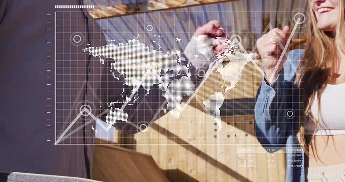 Man and woman bumping fists on ramp under pergola, updating animated technology world map and graph