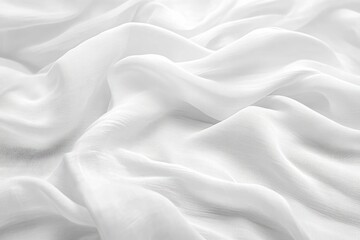 Soft white fabric with gentle folds and delicate texture creating a calm and serene atmosphere