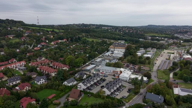 Aerial Krakow Poland parks neighborhood residential 6. Royal Capital City southern Poland on Vistula River, second in population. Economic, historical buildings. Once Soviet, now NATO EU. Economy.