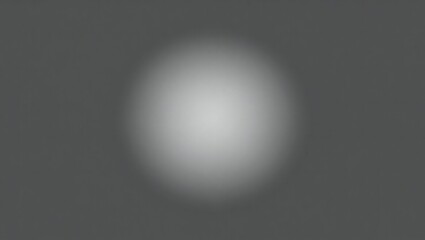 Abstract blurred oval shape with bright center on dark background