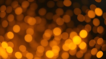Obraz premium Dreamy golden bokeh sparkles on a dark background creating an atmospheric glowing effect.