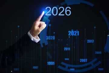 Businesswoman using virtual screen on dark background