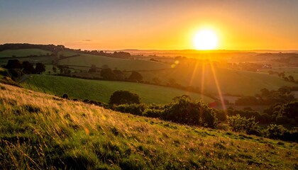 Panoramic sunset over rolling green hills