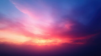 Vibrant sunset sky with dramatic pink, purple, and blue clouds creating a peaceful and awe-inspiring atmosphere