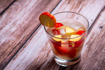 Brazilian Cachaça Cocktail with Cashew Fruit and Ice