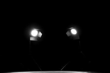 Glowing studio light on black background