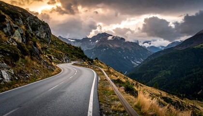 Winding mountain road at sunset