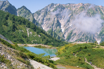 Naklejka premium 日本：標高2060ｍの八方池と白馬連峰の「天狗ノ頭」【八方尾根】長野県白馬村・9月