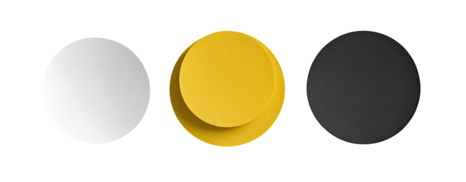 Three circular shapes, white, yellow, and black