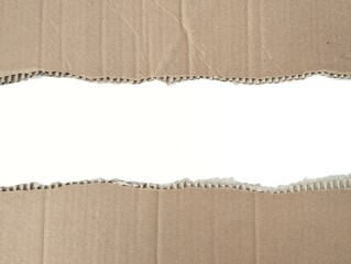 Brown ripped torn cardboard edge strips isolated on white background. Copy space 