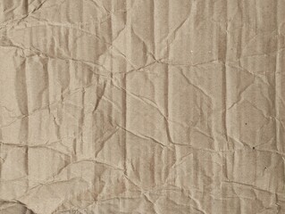 Abstract crumpled brown cardboard texture background. Copy space 