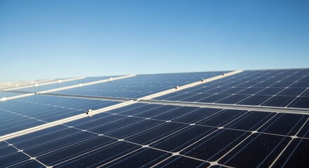 Close-up of Solar Panels Reflecting Clear Blue Sky on a Sunny Day