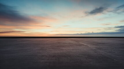 Fototapeta premium Panoramic view of empty asphalt road with sunset sky, high quality image. Suitable for websites, posters, and outdoor adventures.