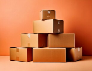 Obraz premium Stack of cardboard boxes on a peach background white background