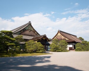 Fototapeta premium Premium Authentic Mountain Temple Architecture with Ornate Roofs and Landscaped Gardens at Nijo Castle for Travel Marketing and Cultural Editorial Content