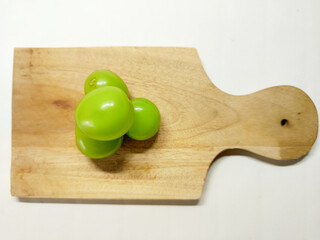 Fresh Green Grapes on a Wooden Cutting Board A Healthy and Delicious Snack