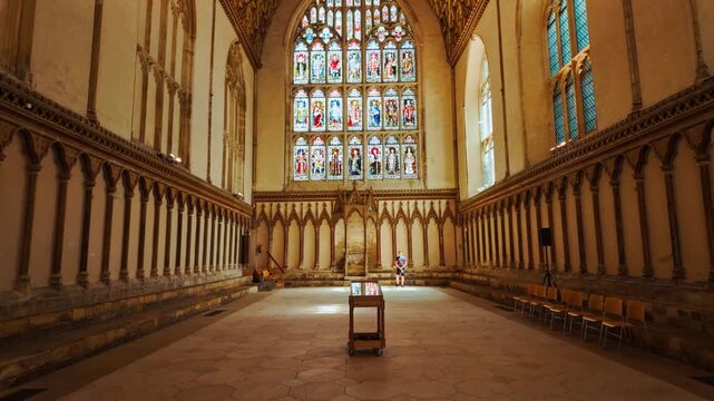 Chapter House, Canterbury Cathedral, Canterbury, Kent, England, UK, with vaulted ceiling, tall windows and quiet seating